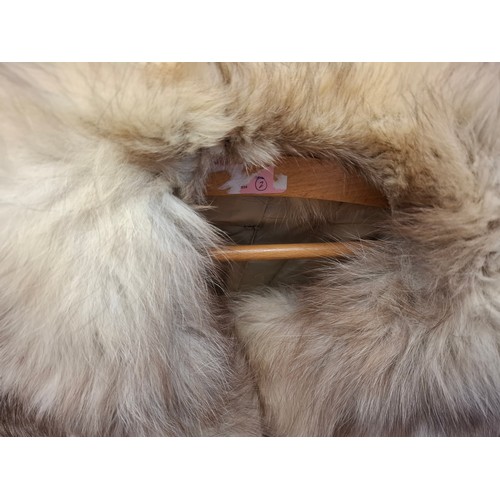 73 - Three vintage fur coats comprising a Saga Fox jacket, approx 38