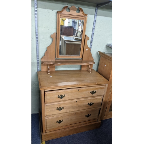 589 - A Victorian pine three drawer chest of drawers with a swing mirror above, 156cm h x 85cm w
Location:... 