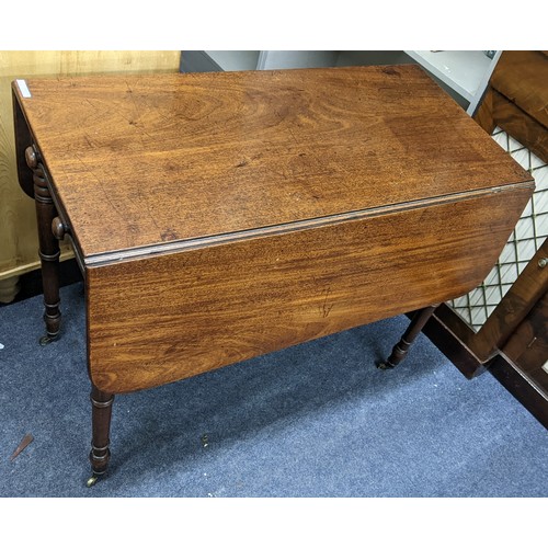 588 - An early 19th century mahogany Pembroke table having a single drawer and on turned tapering legs, 72... 