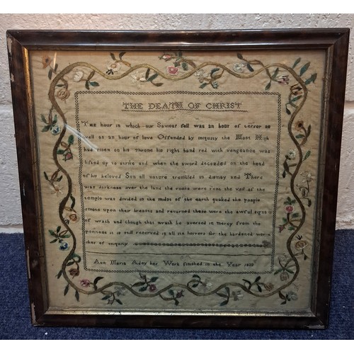 61 - An 1830 embroidered sampler worked by Maria Adey depicting religious verse surrounded by floral vine... 