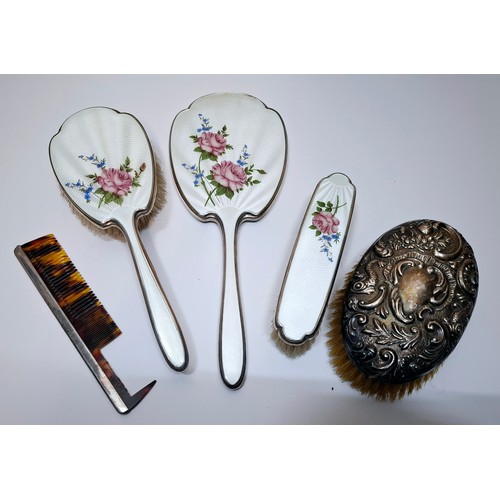 71 - A 3-piece silver and white enamel guilloche dressing table set, a white metal backed clothes brush a... 