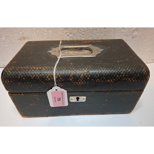 70 - A Victorian grained leather bound jewellery casket, English Made, no internal tray together with a q... 