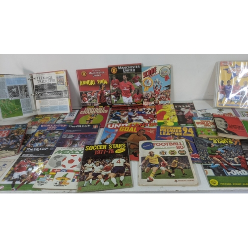 430 - A collection of football ephemera to include Panni's Football 80 Ron Greenwood magazine 1998 England... 