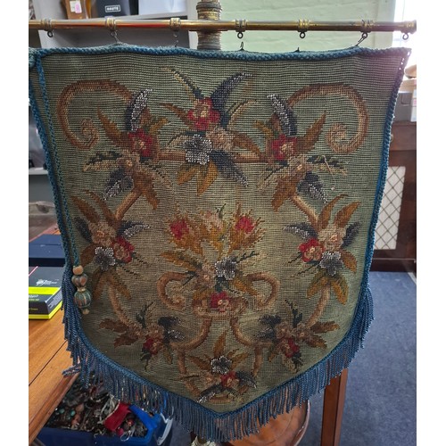 16 - A Victorian mahogany  pole screen with embroidered tapestry banner. Location:RAB
If there is no cond... 