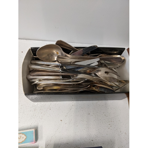 417 - A collection of silver plated flatware t include cake knives, cake forks, a mother of pearl handled ... 