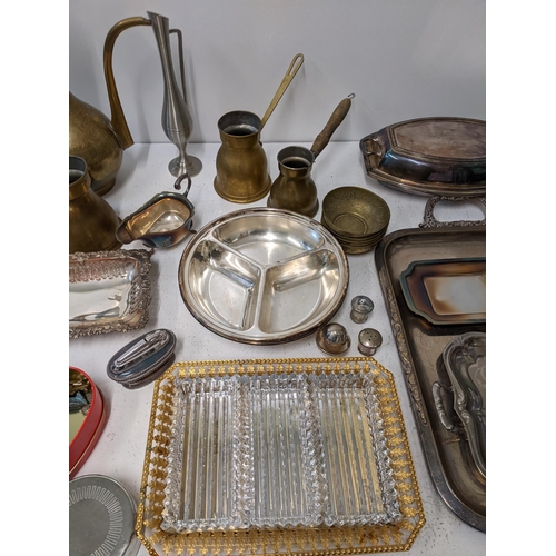 418 - A collection of brass and silver plated items to include a middle eastern coffee pot, a silver plate... 