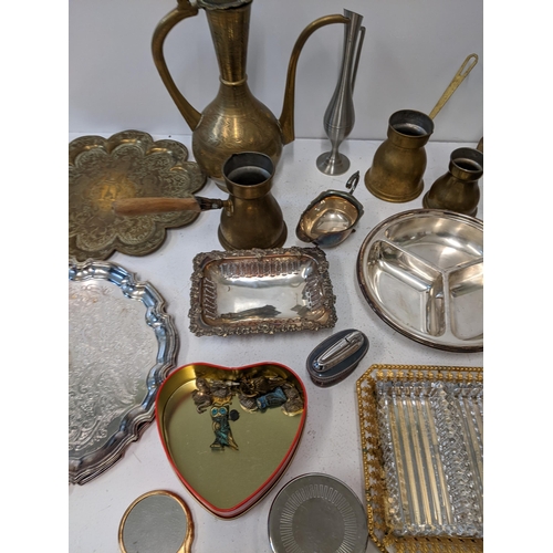 418 - A collection of brass and silver plated items to include a middle eastern coffee pot, a silver plate... 