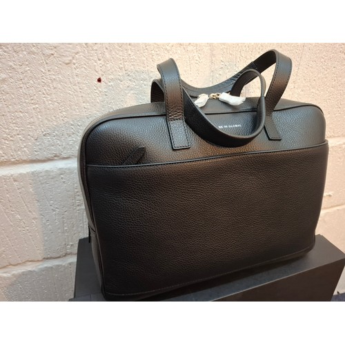 19 - Made In Global-A black grained leather small travel bag, approx 16