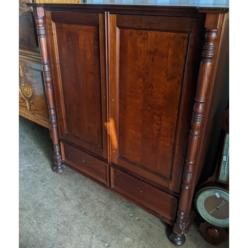 436 - A stained pine cabinet having two doors above two drawers 120cm h x 109cm w Location: BB con
If ther... 