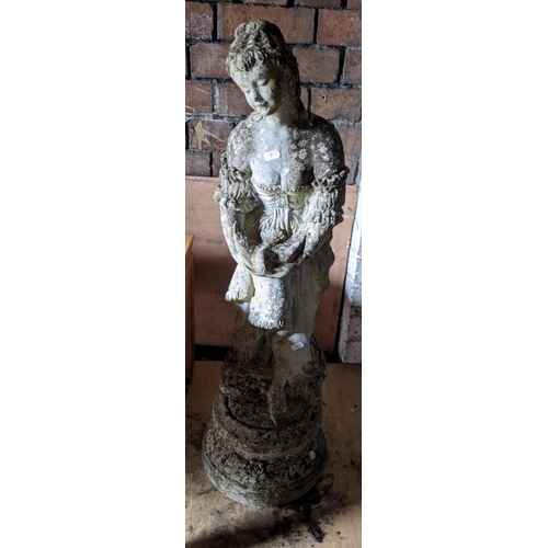 549 - A garden stoneware statue in the form of a classical lady holding a dove, 85cm h Location:DH
If ther... 