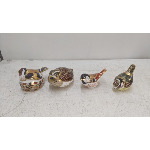 568 - Four Royal Crown Derby paperweights to include 'Nesting Gold Finch' with silver stopper, and another... 