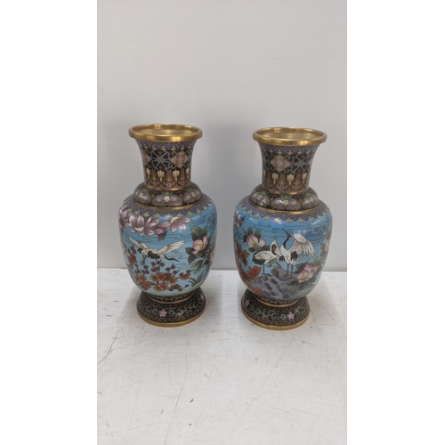 570 - Two 20th century Chinese cloisonne vases decorated with birds and floral scenes
Location:11.2
If the... 