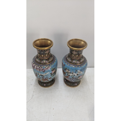 570 - Two 20th century Chinese cloisonne vases decorated with birds and floral scenes
Location:11.2
If the... 