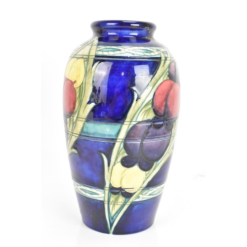 11 - A Moorcroft vase, circa 1947-53, in the 'Banded Wisteria' pattern, of ovoid form with coloured flowe... 