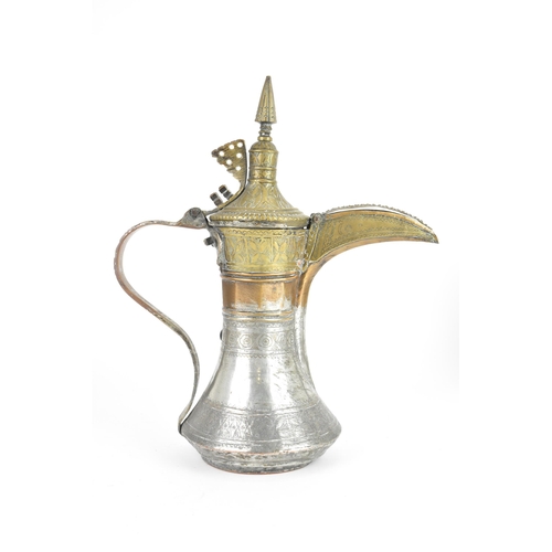 119 - An 18th/19th century silvered copper and brass Dallah coffee pot, having a tapering finial and pierc... 