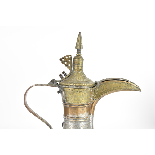 119 - An 18th/19th century silvered copper and brass Dallah coffee pot, having a tapering finial and pierc... 