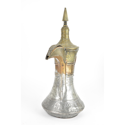 119 - An 18th/19th century silvered copper and brass Dallah coffee pot, having a tapering finial and pierc... 