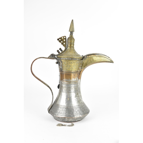 119 - An 18th/19th century silvered copper and brass Dallah coffee pot, having a tapering finial and pierc... 