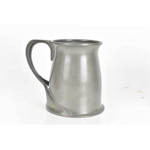 15 - A Liberty & Co Tudric Pewter tankard, designed by Oliver Baker, model No.066, having a planished bod... 