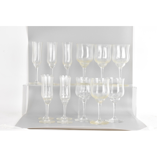 18 - A collection of Baccarat Capri pattern glassware to include seven champagne glasses measuring 18.8cm... 