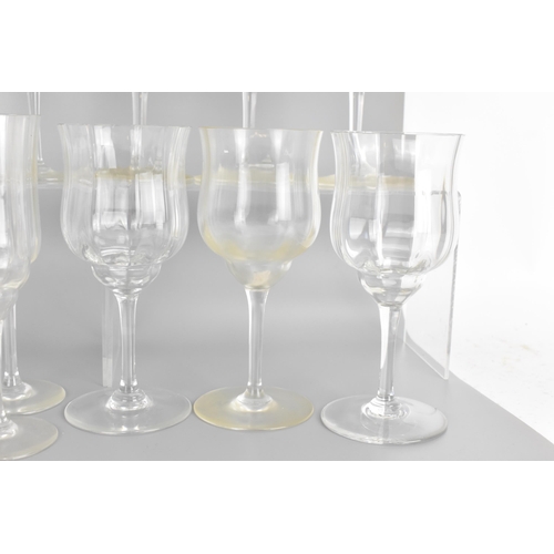 18 - A collection of Baccarat Capri pattern glassware to include seven champagne glasses measuring 18.8cm... 