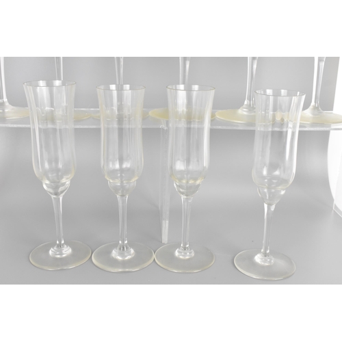 18 - A collection of Baccarat Capri pattern glassware to include seven champagne glasses measuring 18.8cm... 