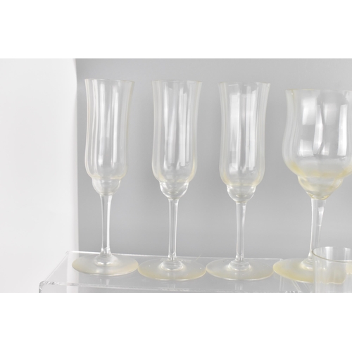 18 - A collection of Baccarat Capri pattern glassware to include seven champagne glasses measuring 18.8cm... 