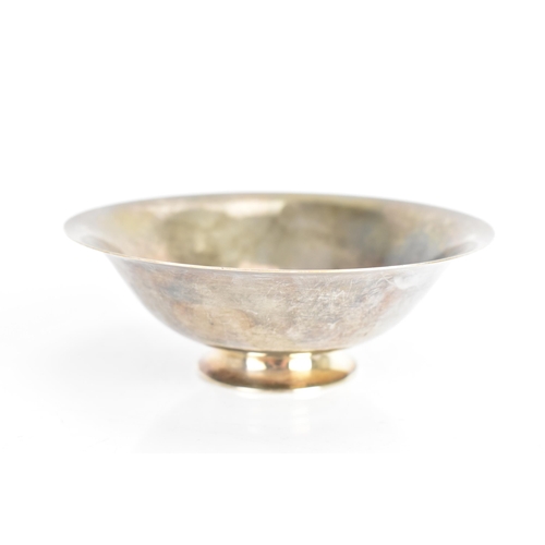 32 - A Georg Jensen Danish Sterling silver sugar bowl and spoon, the bowl no. 575 with everted rim and ra... 