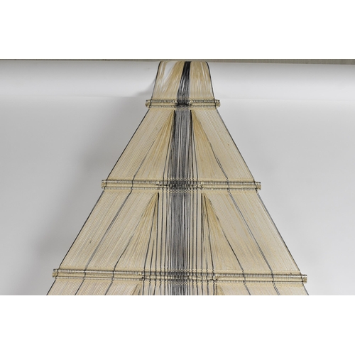 35 - Peter Collingwood O.B.E. (British 1922-2008) A Macrogauze linen and steel rods wall hanging, with me... 