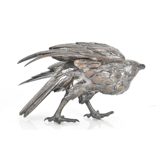 37 - A circa 1900 silver plated bronze sculpture of a bird, in a standing pose about to take flight, unma... 