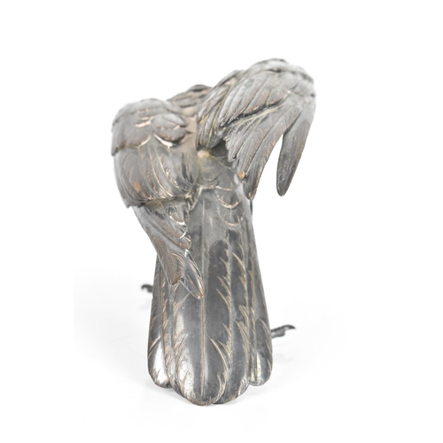 37 - A circa 1900 silver plated bronze sculpture of a bird, in a standing pose about to take flight, unma... 