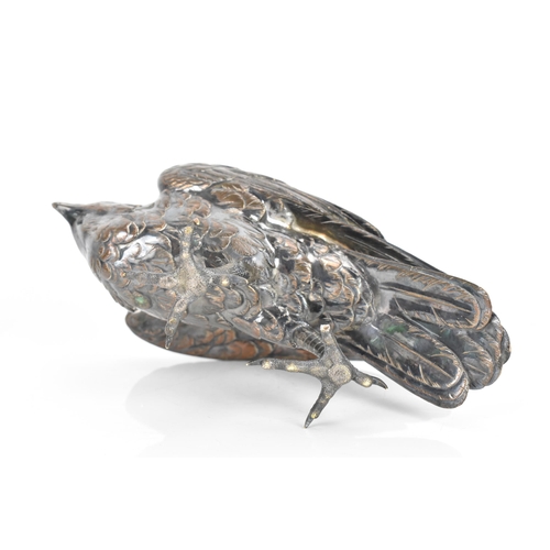 37 - A circa 1900 silver plated bronze sculpture of a bird, in a standing pose about to take flight, unma... 