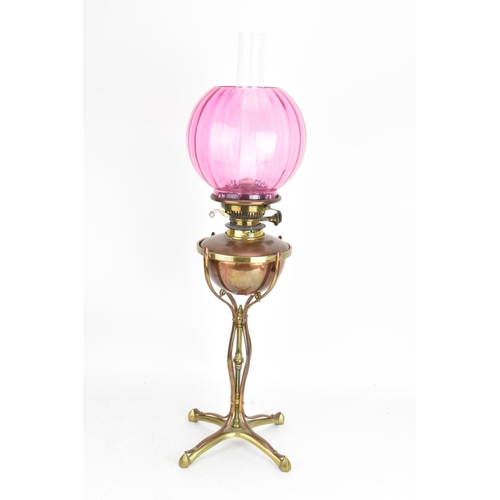 39 - A William Arthur Smith Benson (1854-1924) Arts & Crafts oil lamp, circa 1890, the copper reservoir s... 