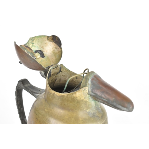 42 - A 1930s Chinese coffee pot, in the form of a penguin, having a hinged lid and pouring spout, the cas... 