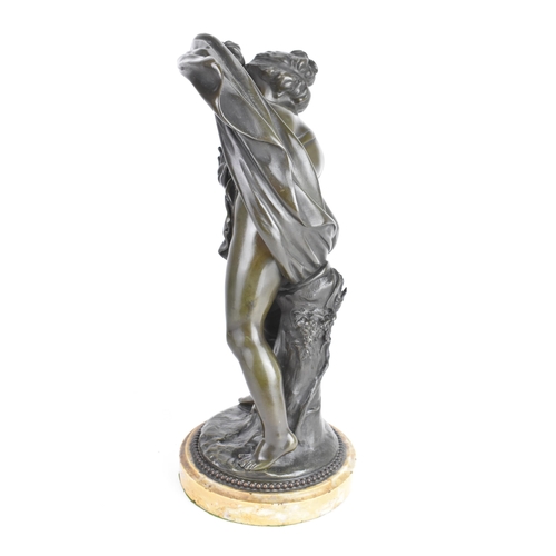 49 - A late 19th century patinated bronze figure emblematic of Summer standing on a naturalistic base, si... 