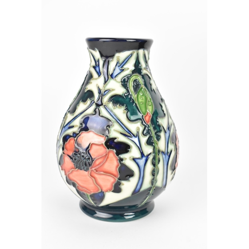 55 - A modern Moorcroft 'Poppy' pattern vase designed by Rachel Bishop, of baluster form, impressed and p... 