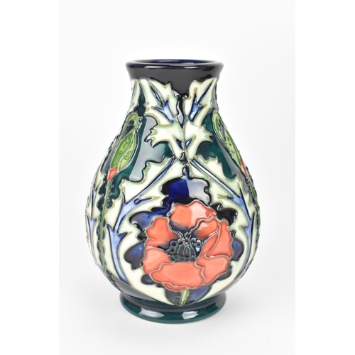 55 - A modern Moorcroft 'Poppy' pattern vase designed by Rachel Bishop, of baluster form, impressed and p... 