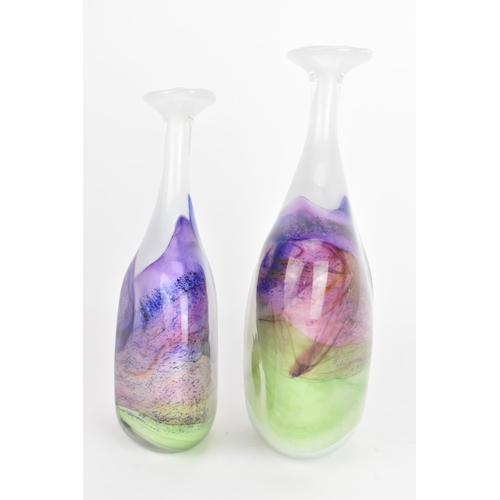 59 - Two Thomas Petit studio glass 'Moors' flattened bottle vases, each in shades of purple, pink and gre... 