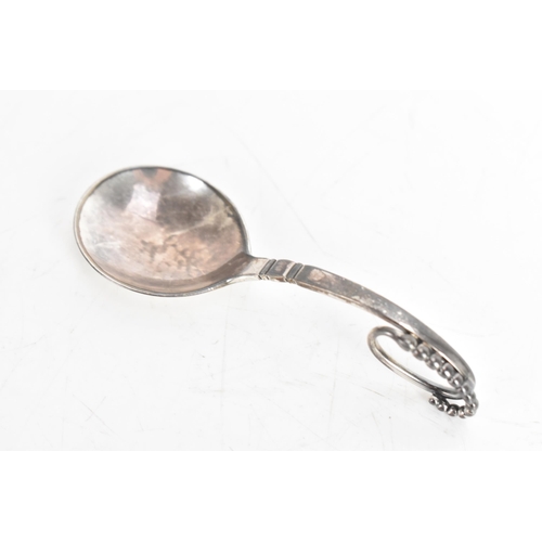 7 - A Georg Jensen Danish Sterling silver sugar bowl and spoon, the bowl no. 575 with everted rim and ra... 