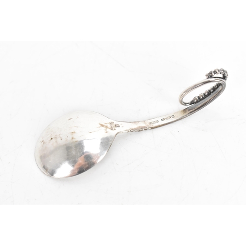 7 - A Georg Jensen Danish Sterling silver sugar bowl and spoon, the bowl no. 575 with everted rim and ra... 