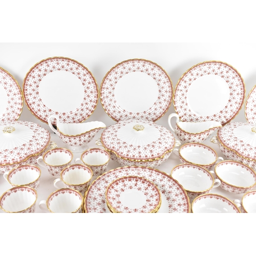 82 - A Spode Fleur De Lys Red pattern part dinner and tea service, printed marks to the bases, pattern no... 