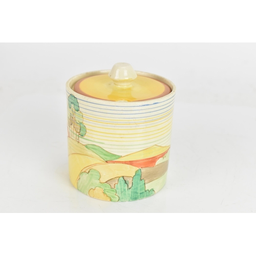 9 - An Art Deco Clarice Cliff drum shaped preserve pot and cover, having a black printed 'Clarice Cliff ... 