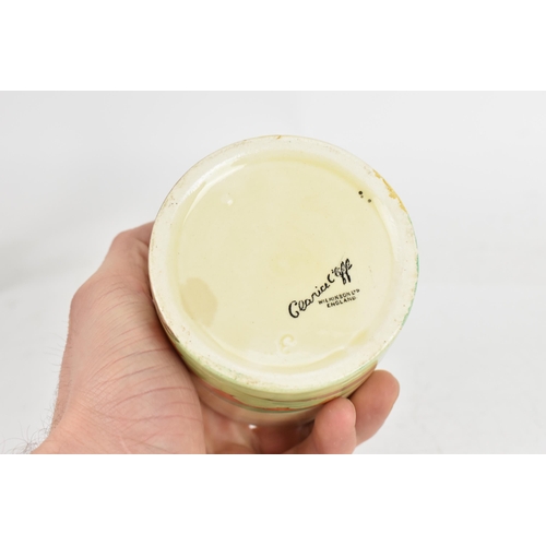 9 - An Art Deco Clarice Cliff drum shaped preserve pot and cover, having a black printed 'Clarice Cliff ... 