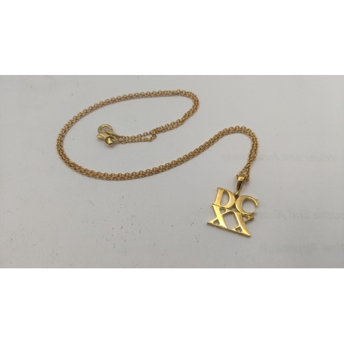 20 - An 18ct yellow gold initial letters pendant 'D.C.X.X' on an 18ct yellow gold necklace, total weight ... 