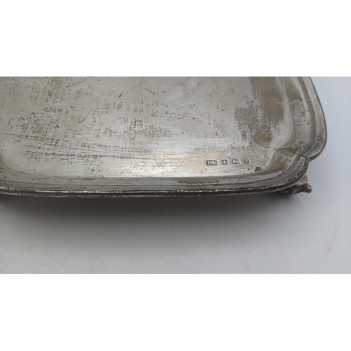 31 - A Viner's Ltd silver tray four feet in square form, hallmarked Sheffield 1934, 19x19 cm. 359.1g
Loca... 