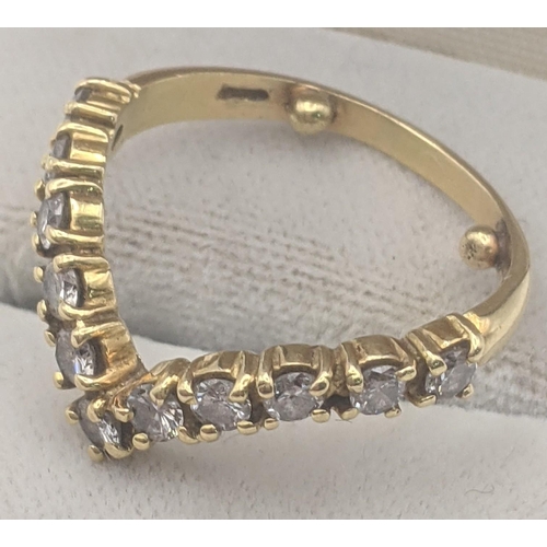 38 - An 18ct yellow gold wishbone 11 stone diamond ring, size N, 3.8g
Location:
If there is no condition ... 