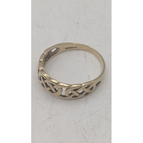 41 - A 9ct yellow gold Celtic weave style ring, size N 1/2, 2.1g
Location:
If there is no condition repor... 