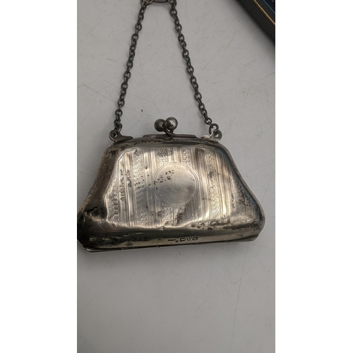 65 - Silver items to include a George V silver purse hallmarked Chester 1920 having engine turned decorat... 