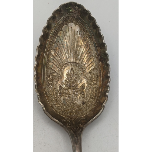 67 - A pair of Victorian silver serving spoons having floral and embossed and engraved bowls hallmarked S... 