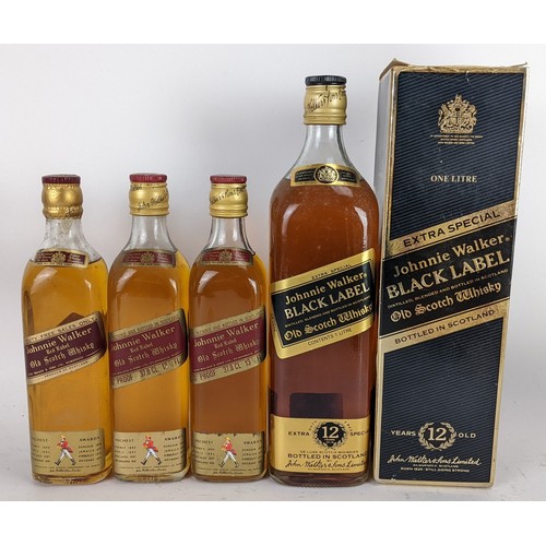 265 - Four bottles of Johnnie Walker whisky to include an Extra Special Black label 12 years with original... 